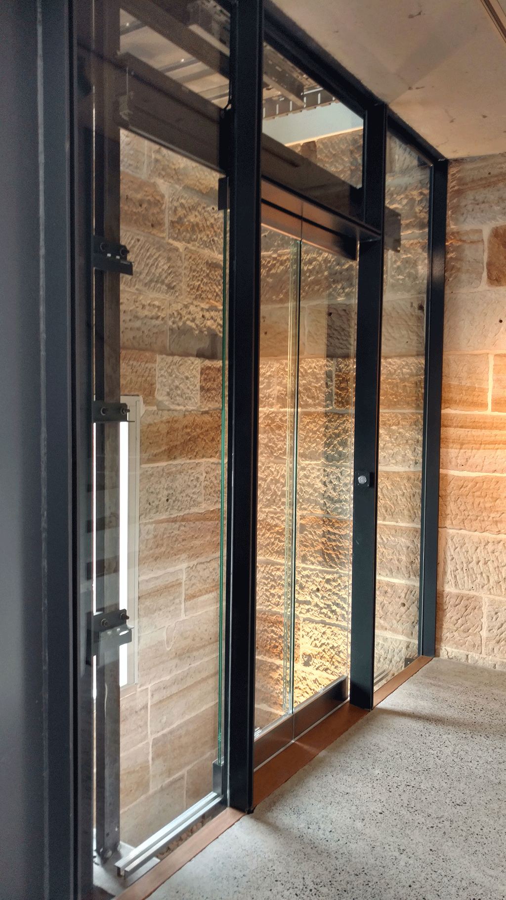 Custom Glass Shaft by Builders